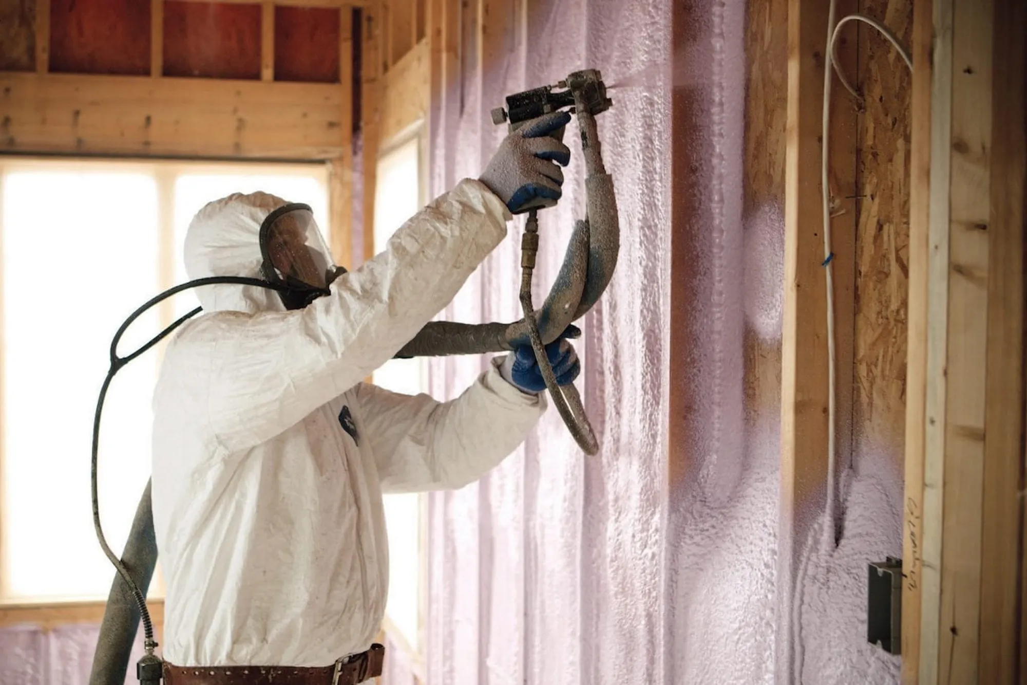 Closed-cell urethane spray foam applied inside an Alaska metal building